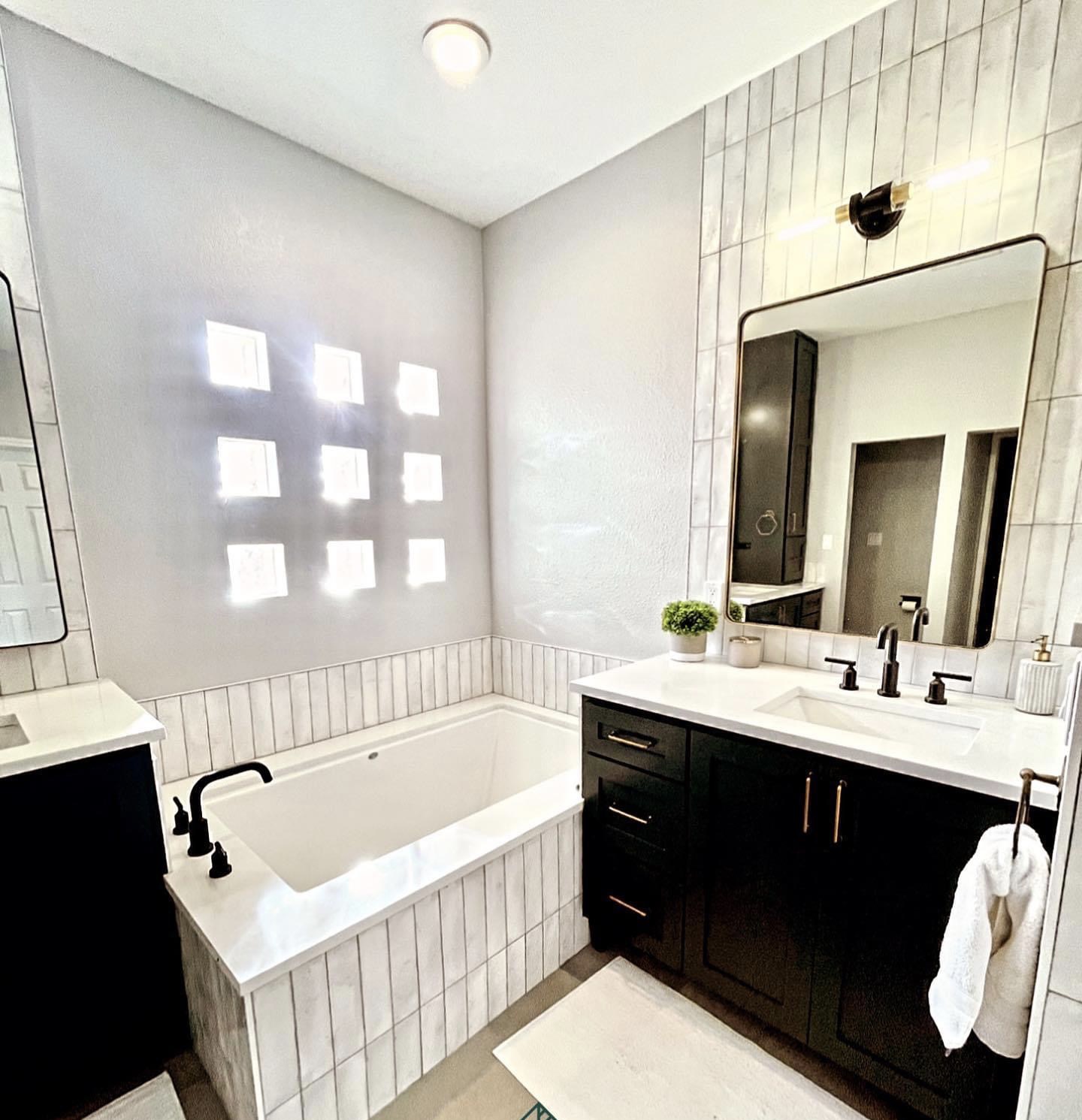 Bathtub with modern vanity styling - contemporary bathroom design