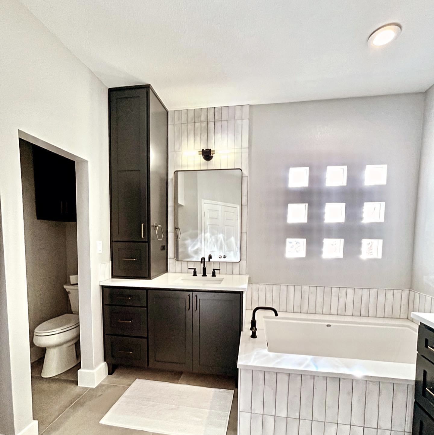 Small bathroom with makeup vanity showing smart space use - Turnkey Bathtubs
