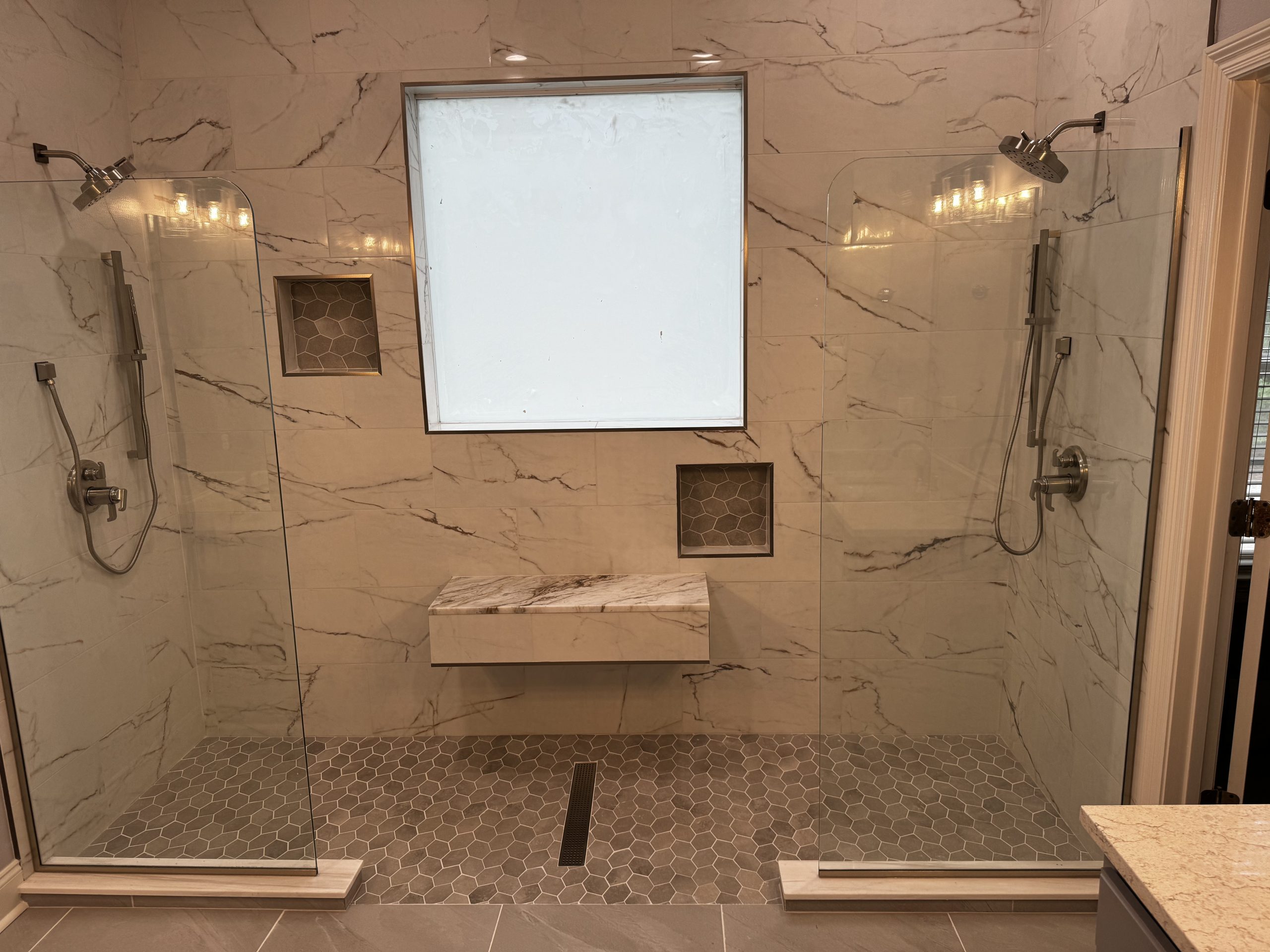 Professional bathroom installation with multiple fixtures
